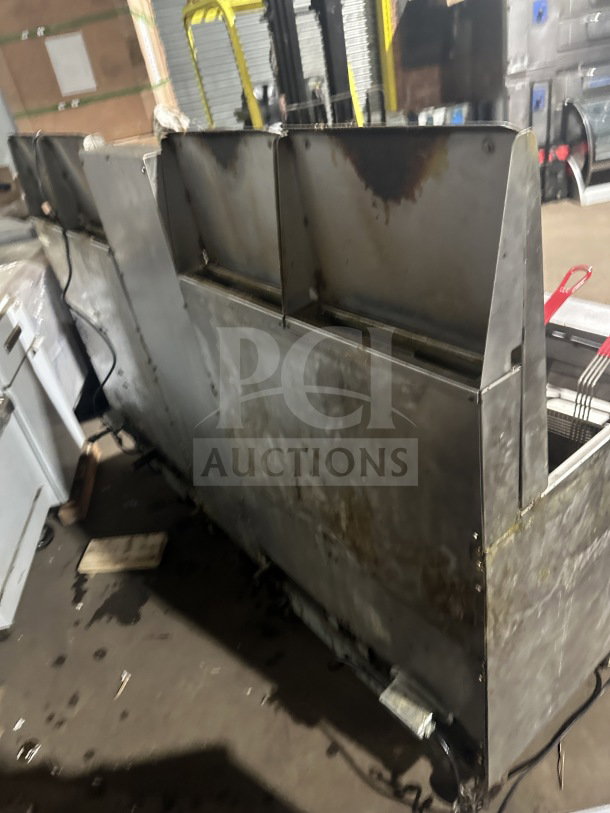 Frymaster FMPH455SC 4-Bay 50 lb. Stainless Steel Fryer, natural gas, digital controls, on casters, with basket and oil filter.