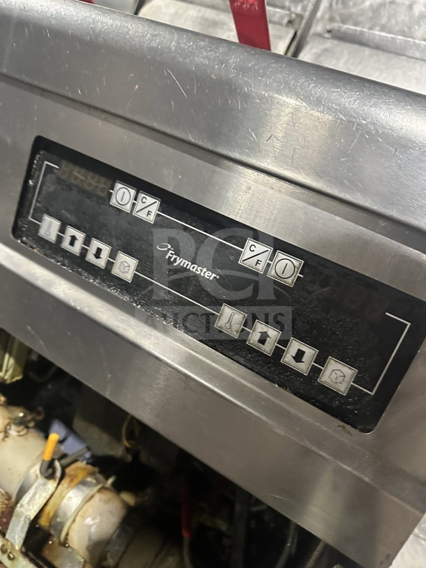 Frymaster 4-bay fryer control panel, model FMPH455SC, stainless steel, digital controls, light wear visible.