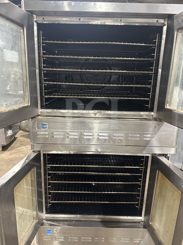 Blodgett commercial stainless steel double stacked gas convection oven, Energy Star certified, with wired racks and on legs.