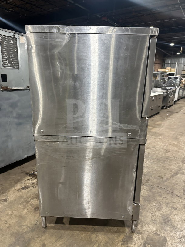 Blodgett stainless steel double stacked gas convection oven, Energy Star certified, with wired rack, on legs.