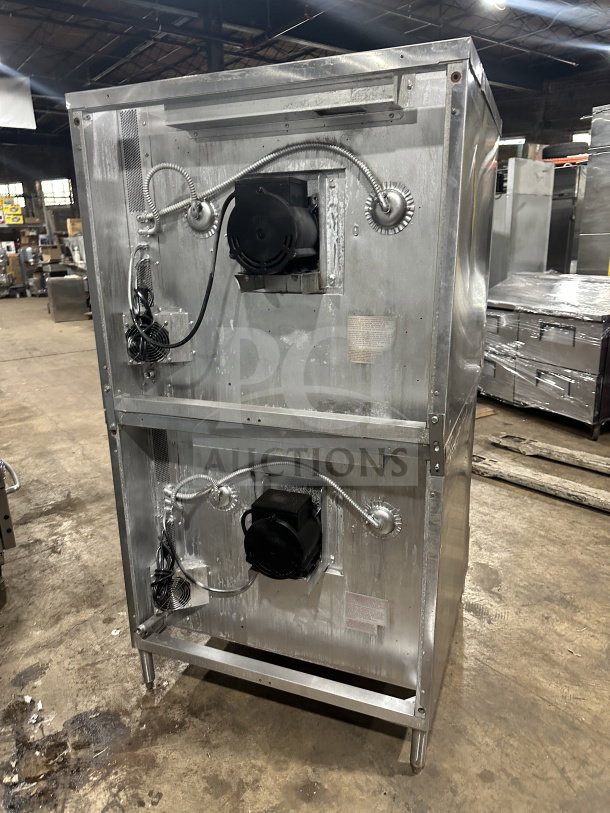 Blodgett stainless steel double stacked convection oven, gas powered, Energy Star certified, with wired oven rack, on legs.