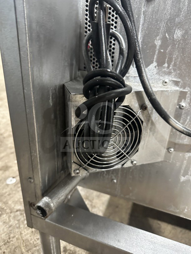 Blodgett stainless steel convection oven's back with power cords and ventilation fan, showing durable metal construction.
