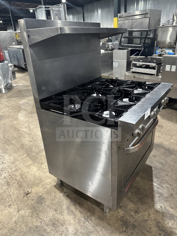 Southbend S36D7N stainless steel 6-burner gas range with oven, backsplash, overhead salamander shelf, and wired oven rack.