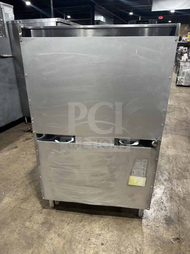Southbend S36D7N commercial 6-burner gas range/oven in stainless steel with backsplash, salamander shelf, wired rack, and legs.
