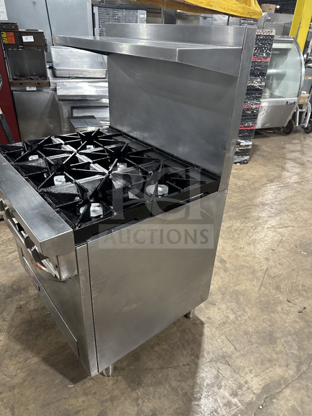 Southbend Model S36D7N stainless steel 6-burner gas range with oven, backsplash, salamander shelf, and wired oven rack.