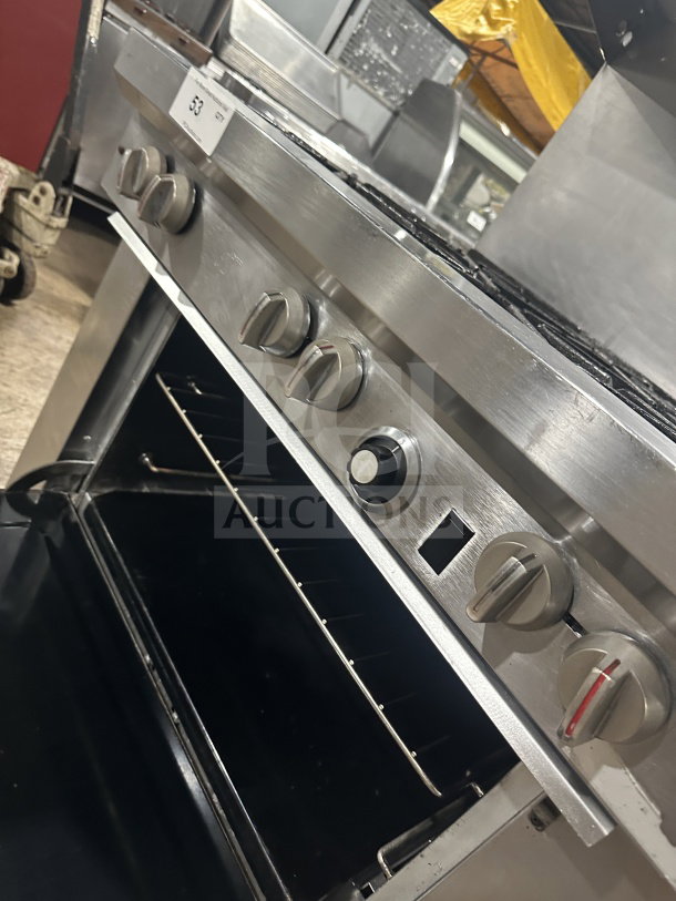 Southbend stainless steel 6-burner range/oven combo, Model S36D7N, with backsplash, salamander shelf, and wired oven rack.