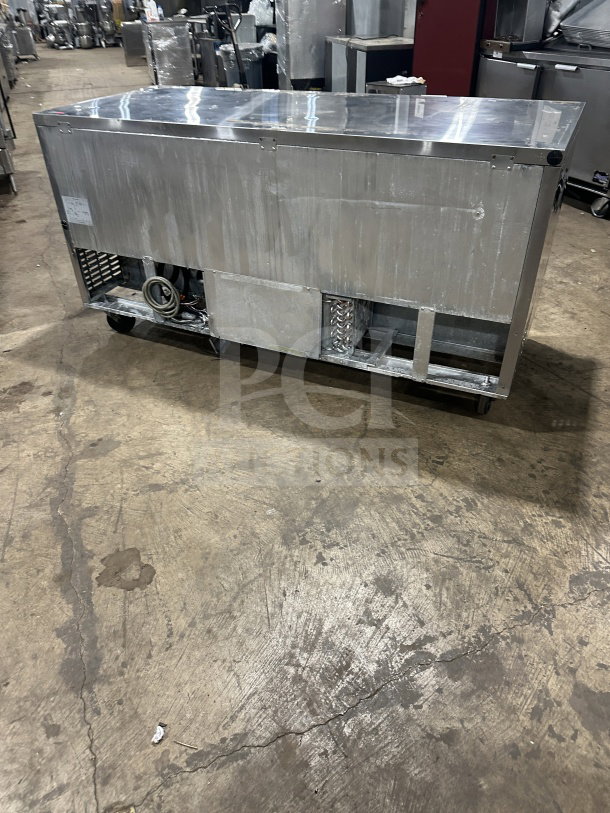 Turbo Air M3 Series 3-Door Undercounter Refrigerator, Model MUR-72, stainless steel, on casters, includes poly-coated rack.