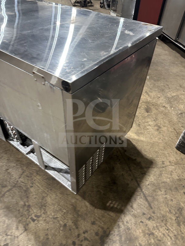 Turbo Air M3 Series MUR-72 stainless steel 3-door undercounter refrigerator, 115V, with poly-coated rack, on casters.