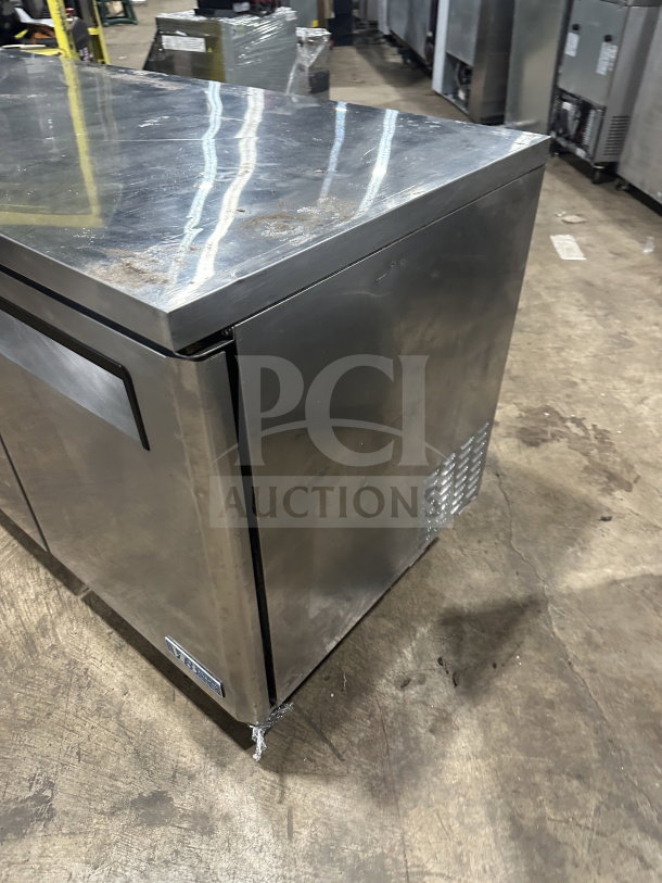 Turbo Air M3 Series 3-Door Stainless Steel Undercounter Refrigerator, Model MUR-72, on casters with poly-coated rack.