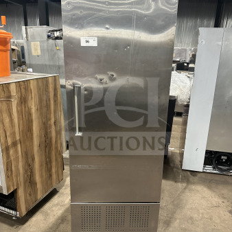 Fagor commercial stainless steel reach-in refrigerator, single solid door, poly coated wired rack, 115V, on casters.