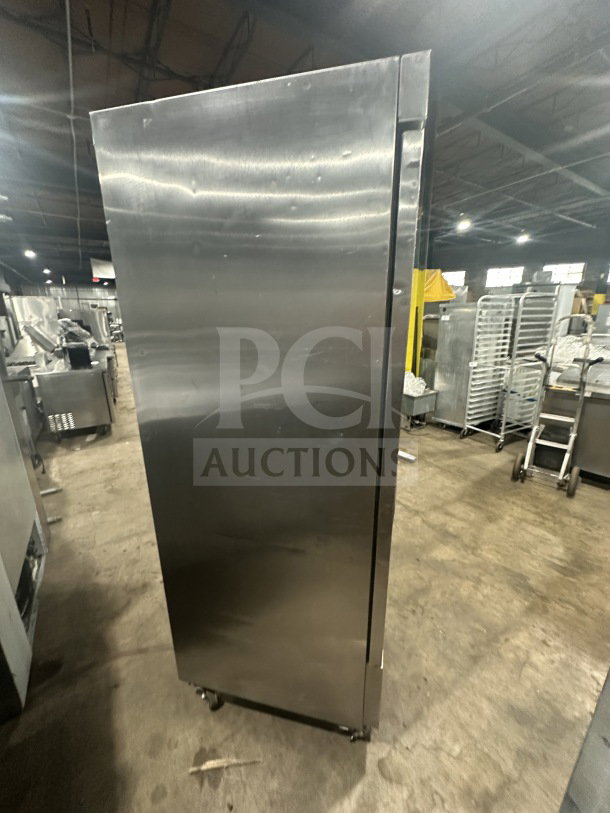Fagor commercial stainless steel reach-in refrigerator with single solid door, poly coated wire rack, 115V, on casters.