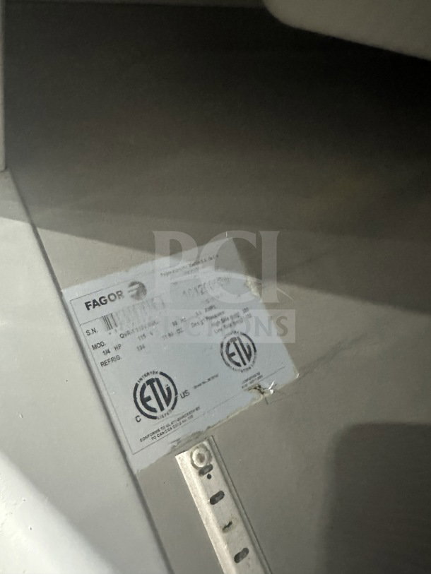 Fagor Commercial stainless steel reach-in refrigerator label, showing model details. Single solid door, poly-coated rack included.