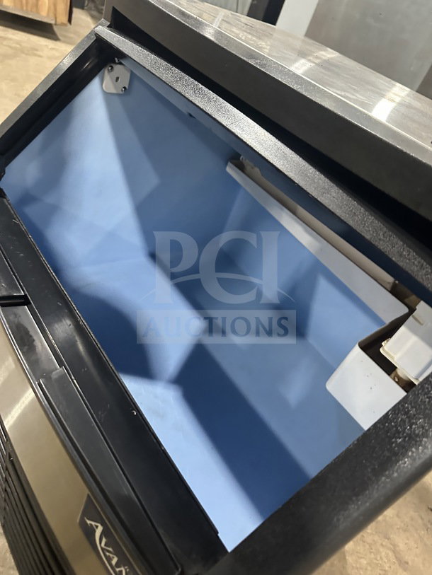 Avantco 194UC160HA ice making machine, stainless steel, electric, air-cooled. Undercounter, open bin view, on legs, 115V.