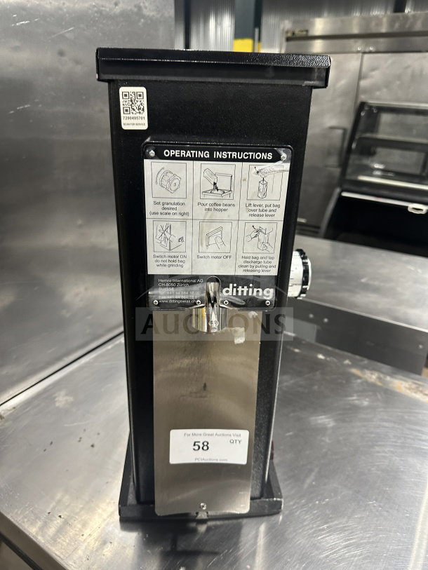Ditting KR1203 coffee bean grinder, serial 2022279016, 120V, 1 phase, with operating instructions on front panel.