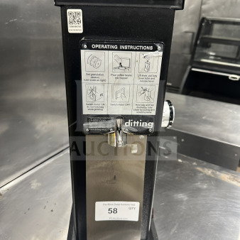 Ditting KR1203 coffee bean grinder, serial 2022279016, 120V, 1 phase, with operating instructions on front panel.
