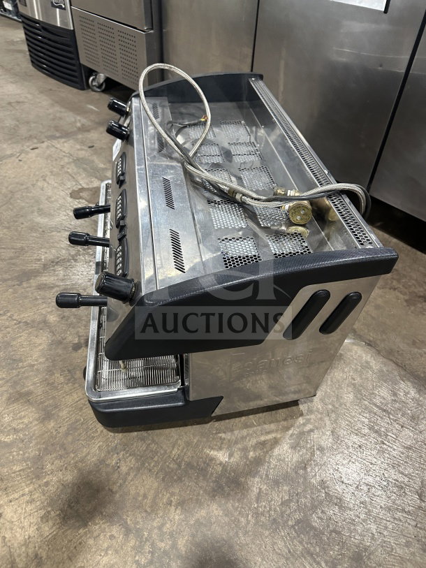 Danesi commercial stainless steel 3-group espresso machine with porta filter handles, excellent condition, countertop model.