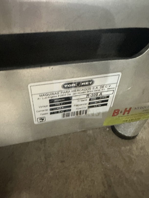 Tor-Rey RB-300A countertop deli meat slicer, electric-powered, stainless steel, model number and details on label.