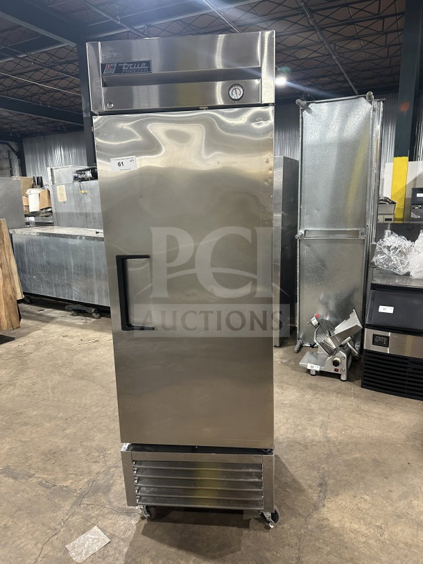 True T-23F stainless steel single-door reach-in freezer on casters. Features Energy Star certification and poly-coated wired rack.