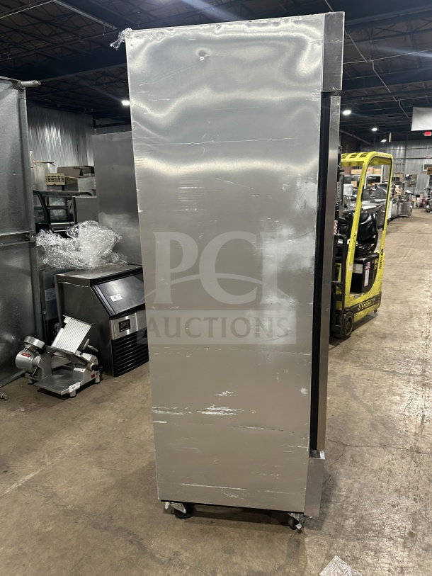 True T-23F single door stainless steel freezer, Energy Star certified, with poly coated wired rack, on casters.