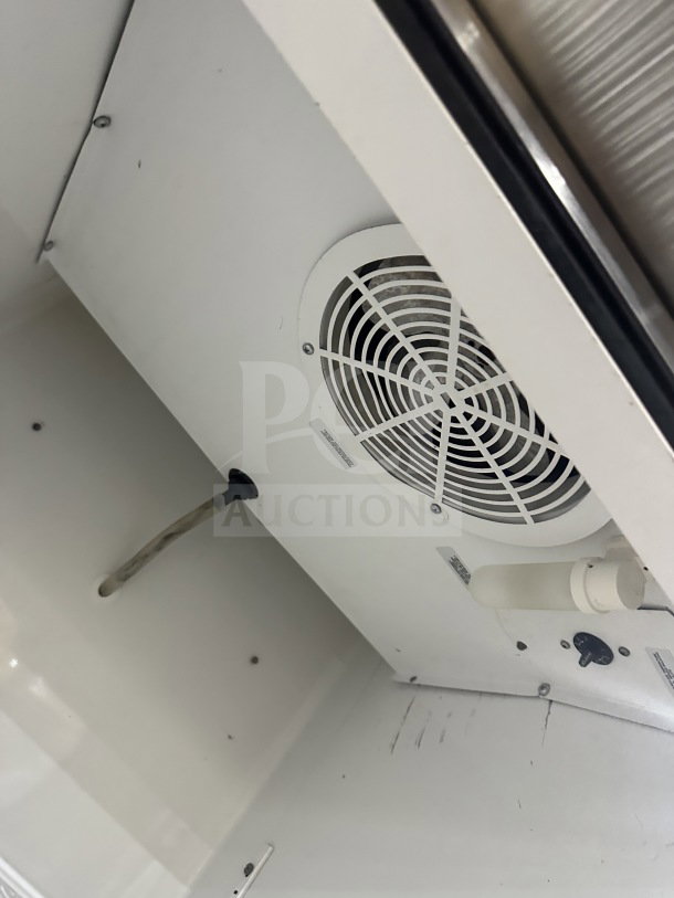 True T-23F single door freezer interior, white finish, fan, PVC-coated wires, Energy Star, on casters, model T-23F.