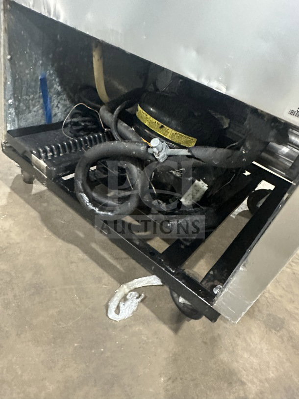 True T-23F stainless steel freezer, Energy Star certified, single door, includes poly-coated rack, on casters, model SN: 5174965, 115V, 1 phase.