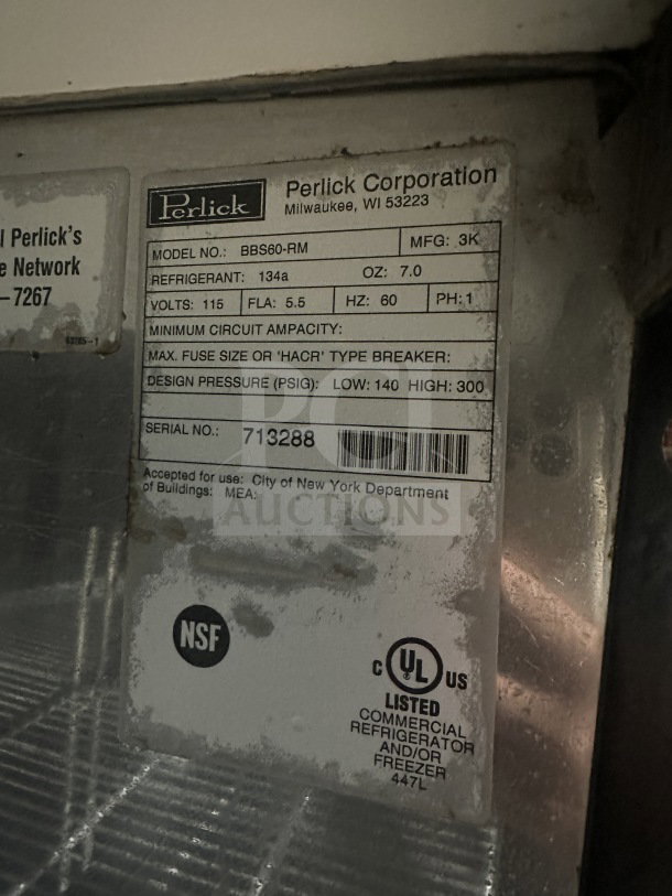 Perlick BBS60RM Black 2-Door Back Bar Cooler with stainless steel worktop, poly-coated wire racks, on casters, 115V, 1 phase, serial number 713288.