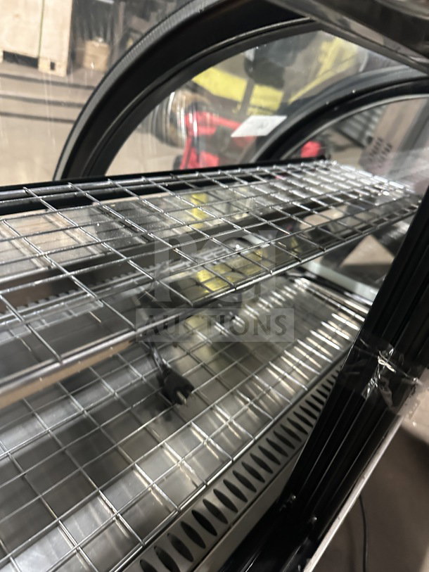 Vollrath RDE8363 refrigerated display case with curved glass, stainless steel body, wire shelving, front and rear access.