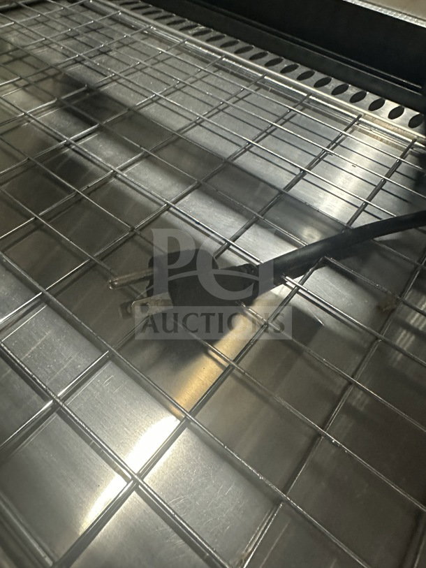 Vollrath RDE8363 refrigerated display case grid shelf and plug, stainless steel surface, commercial-grade, 120V.