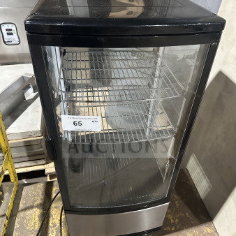 Berg RT-78L glass door merchandiser, chrome rack, model RT78L, 115V, used condition, for beverage/food display.