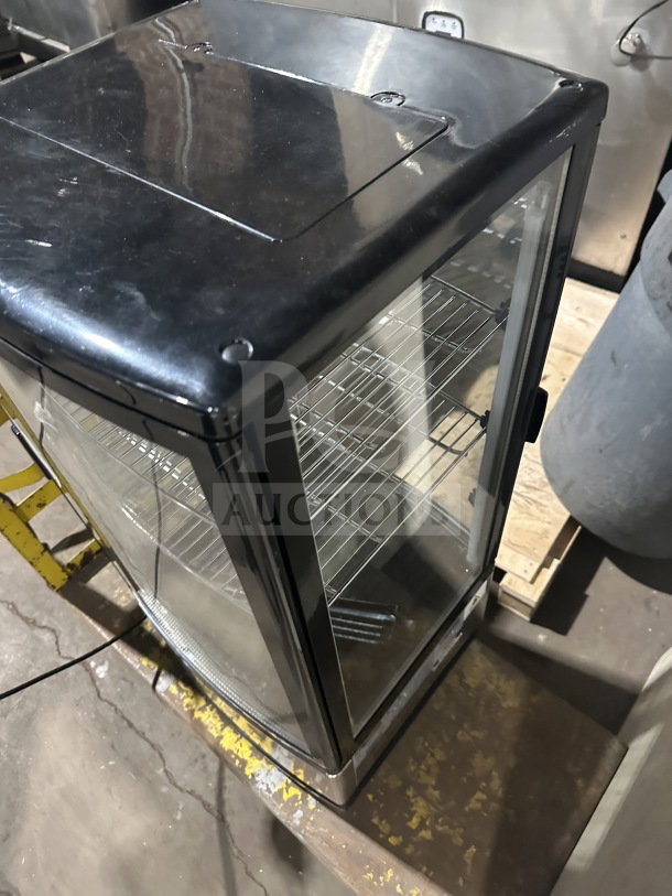 Berg RT-78L refrigerated display merchandiser with chrome rack, glass door; commercial countertop model, good condition.