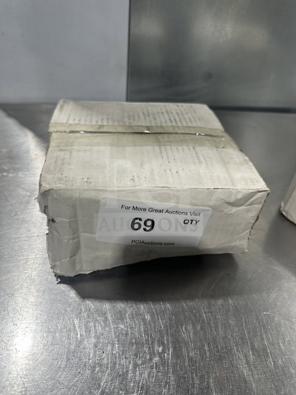 Brand new American MetalCraft stainless steel pan gripper, Model 9525, SN: 704339108405, in original packaging.