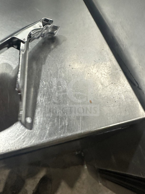 Brand new AmericanMetalCraft pan gripper, model 9525. Stainless steel with ergonomic grip. Ideal for commercial use.
