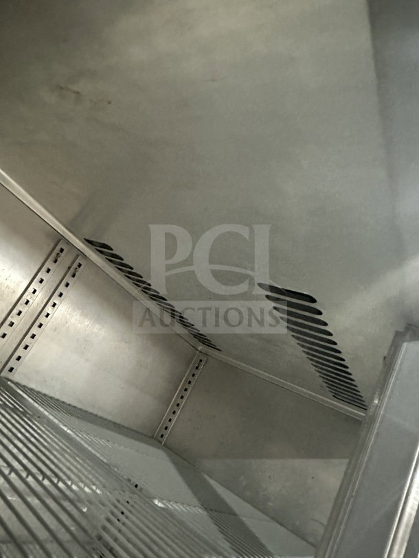 Victory VR2 stainless steel 2-door reach-in refrigerator interior with poly-coated wire racks, adjustable shelves, on casters.