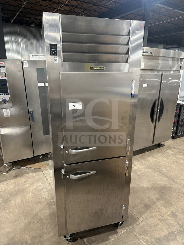Traulsen stainless steel reach-in refrigerator/freezer combo, model RHT132WUTHHS, with pan slide and wired rack, on casters.