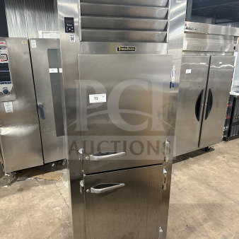 Traulsen stainless steel reach-in refrigerator/freezer combo, model RHT132WUTHHS, with pan slide and wired rack, on casters.