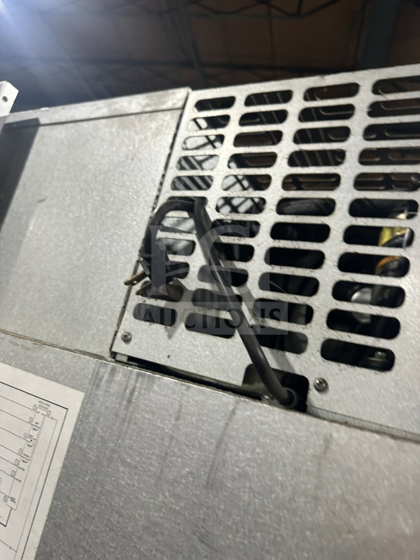 Traulsen RHT132WUT-HHS commercial stainless steel reach-in refrigerator/freezer combo with vent and wiring detail shown.