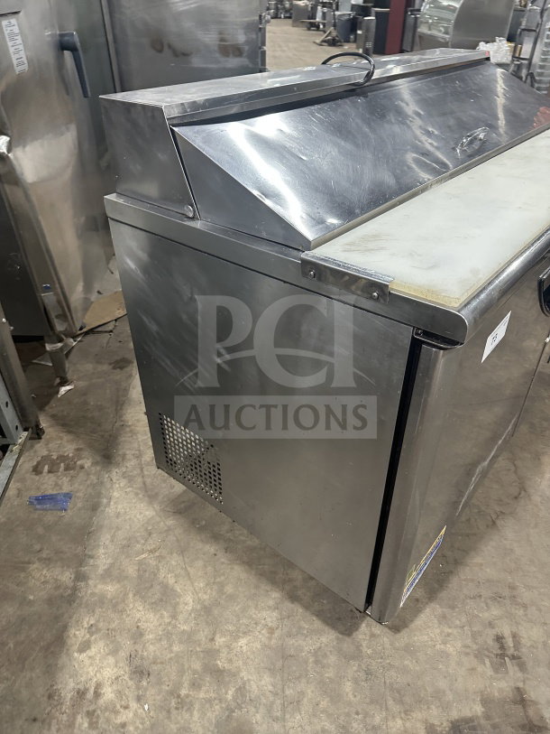 Turbo Air TST60SDD2 refrigerated prep table; stainless steel with single door, two drawers, on casters; 115V; used.
