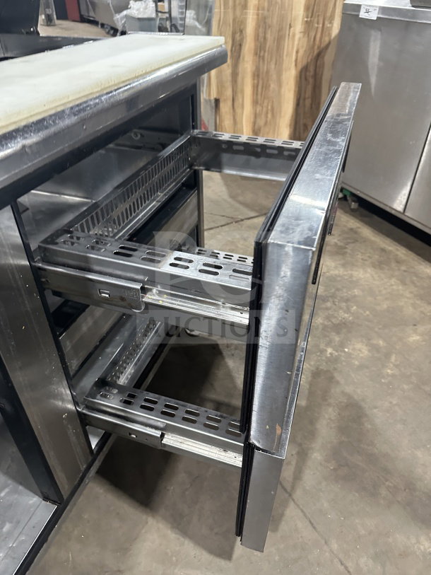 Turbo Air TST60SDD2 refrigerated bain marie prep table with single solid door, 2 drawers, stainless steel, on casters, 115V.