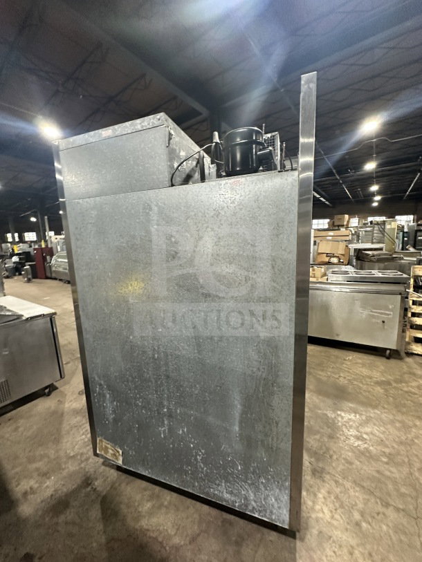 Beverage Air Piedmont Series stainless steel 2-door refrigerator, with poly-coated wire rack, on legs, visible compressor.