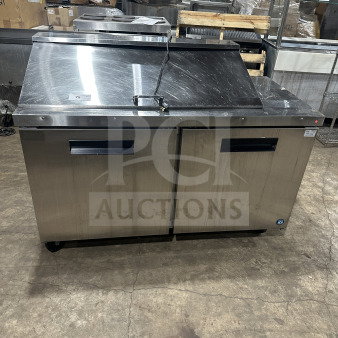 Hoshizaki stainless steel 2-door refrigerated sandwich prep table, model CRMR6018M, on casters, in used condition.