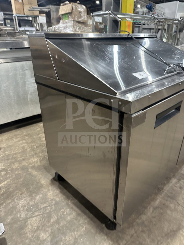 Hoshizaki CRMR6018M stainless steel 2-door refrigerated prep table on casters; commercial-grade, mega top, model SN: F60061C.