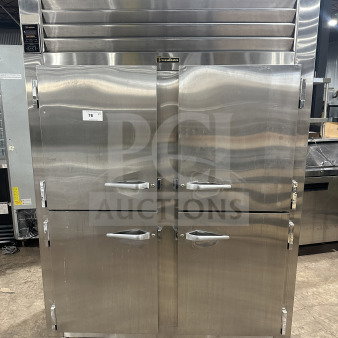 Traulsen stainless steel half-door reach-in refrigerator/freezer, model AHT232WUTHHS, with chrome rack, built-in pan slides.