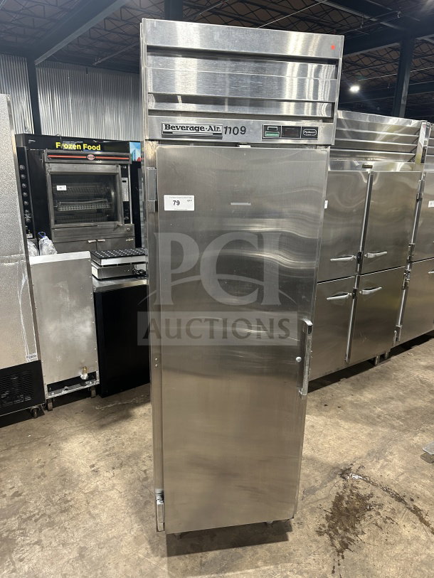 Beverage Air single-door stainless steel reach-in refrigerator with tray slides. Model 1109. On legs, good condition.