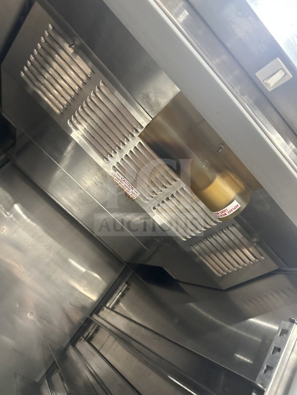 Beverage Air commercial stainless steel single-door refrigerator interior with tray and pan slides, excellent condition.
