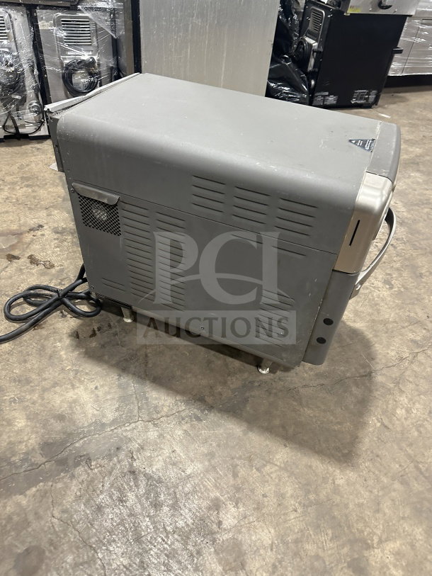 TurboChef NGO countertop rapid cook oven, electric-powered, digital push controls, 208/240V, used condition, on legs.