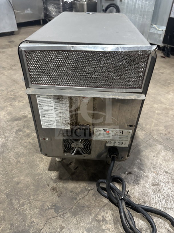 TurboChef NGO electric rapid cook oven, countertop model with digital controls, on legs. Visible label details power: 208/240V 1Phase. Slight wear.