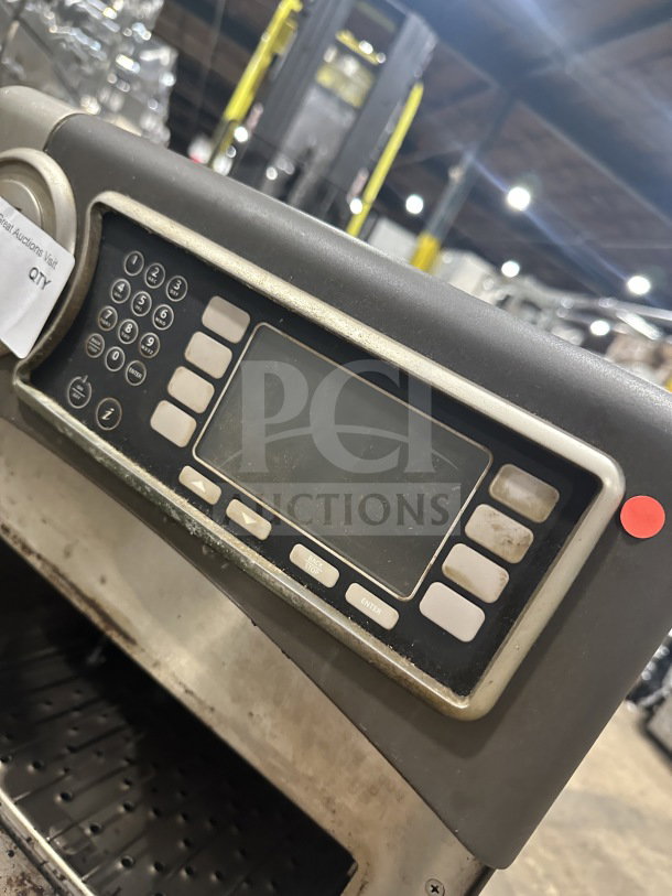 TurboChef NGO Rapid Cook Turbo Oven, digital controls, countertop, 208/240V, used, stainless steel finish, on legs.