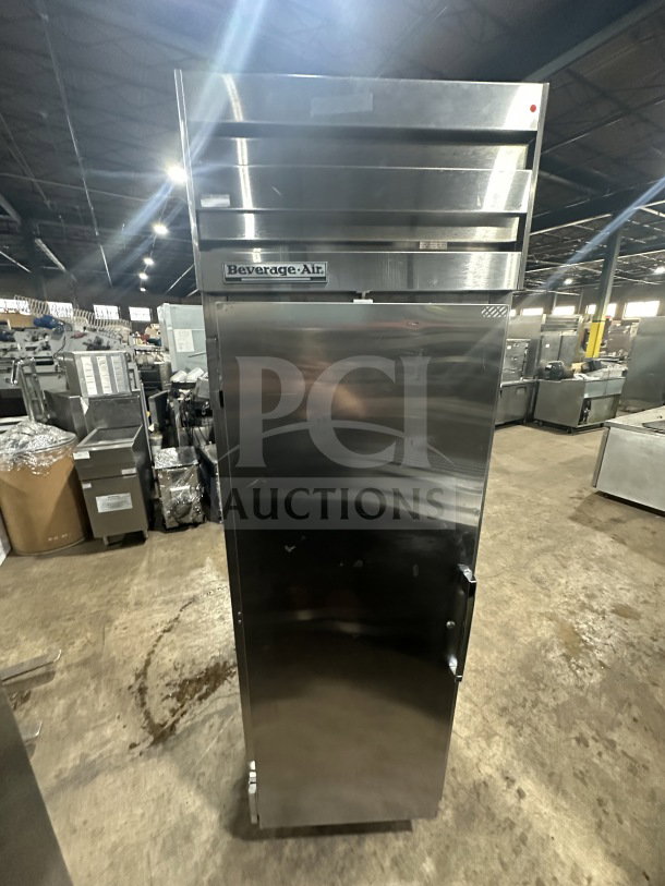 Continental stainless steel 2-door reach-in refrigerator, Model DL1WEHD, includes rack and shelf, on casters, Energy Star certified.