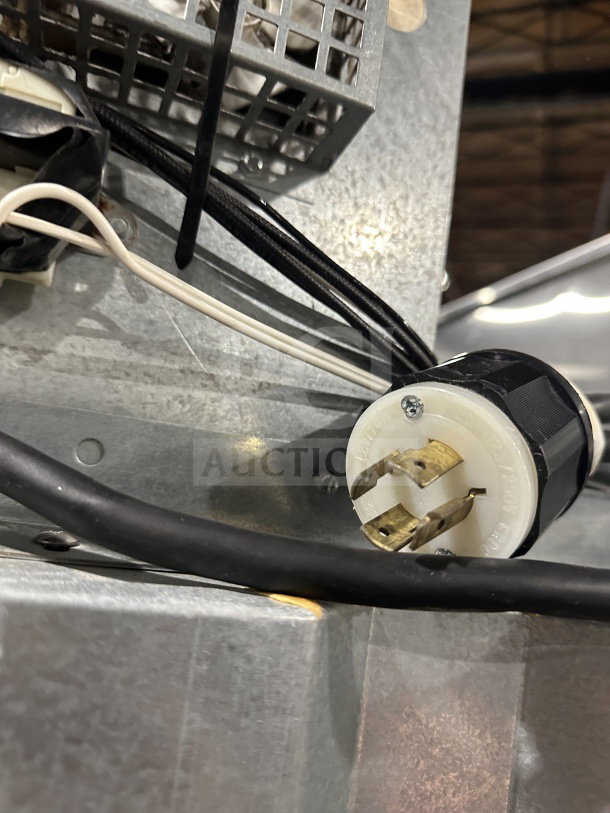 Back view of Continental Commercial Stainless Steel Refrigerator Model DL1WEHD showing power connection and wiring.