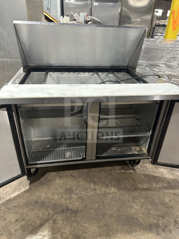 True commercial 2-door bain marie prep table, model TSSU-48-18M-B-HC, stainless steel, poly-coated wire rack, on casters.